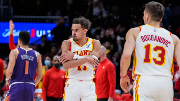 Trae Young celebrates after a made shot.